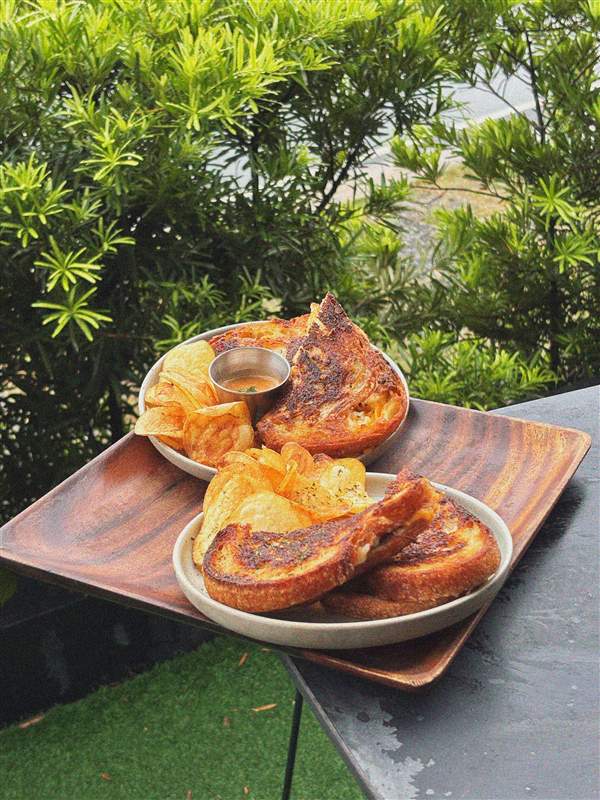 Grilled sandwich and chips shared at Afterhours